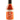 A bottle of The Classic - Chili Maple hot sauce with a black cap features a red and white label highlighting its name, vegan status, and indicating it's a mild hot sauce with just the right amount of spice.